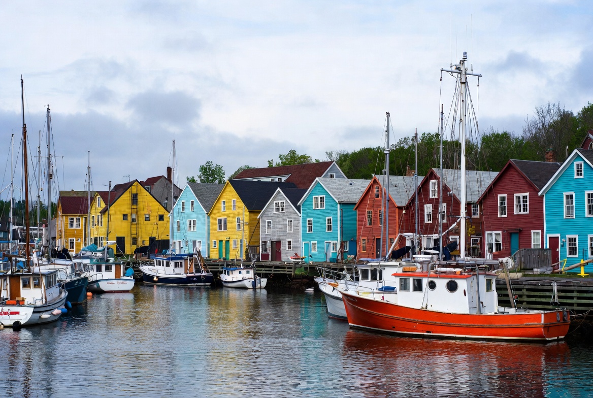 Colourful historic waterfront harbour with fishing boats in Lunenburg Nova Scotia Canada, UNESCO world heritage town