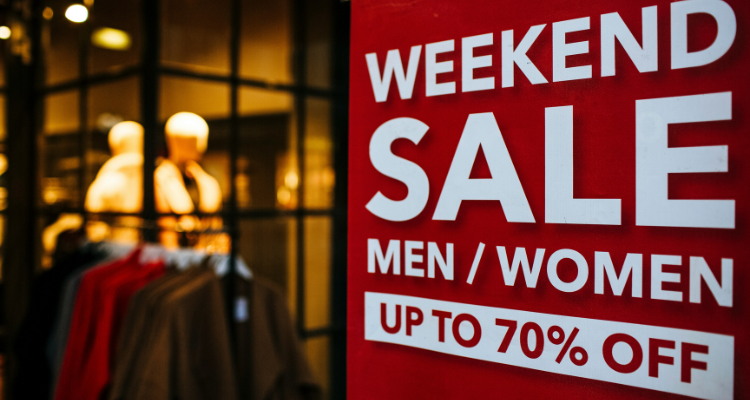 Weekend Sale sign in front of a store
